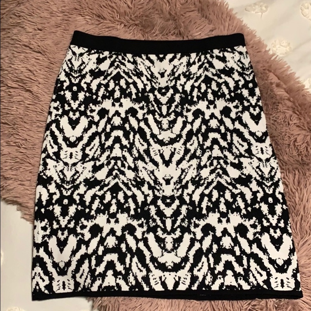 Knee length black and white skirt